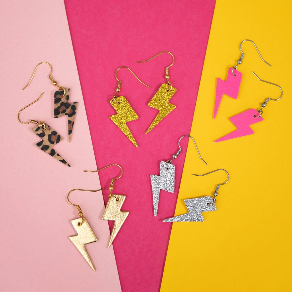 Mini gold glitter lightning bolt earrings