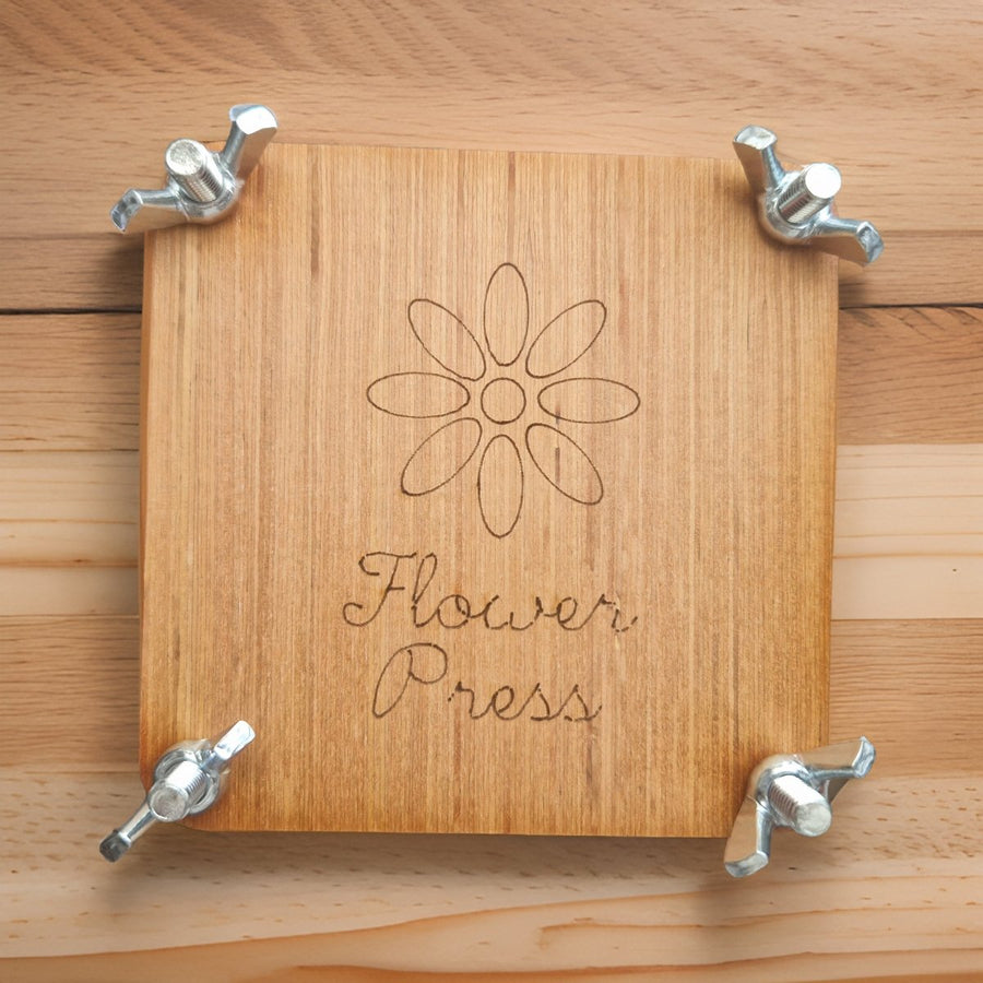 Premium wooden flower press and scented candle gift set for gardeners, lavender or tomato vine fragrance, luxury botanical preservation kit by Ralph's Orchard at brixbailey.com