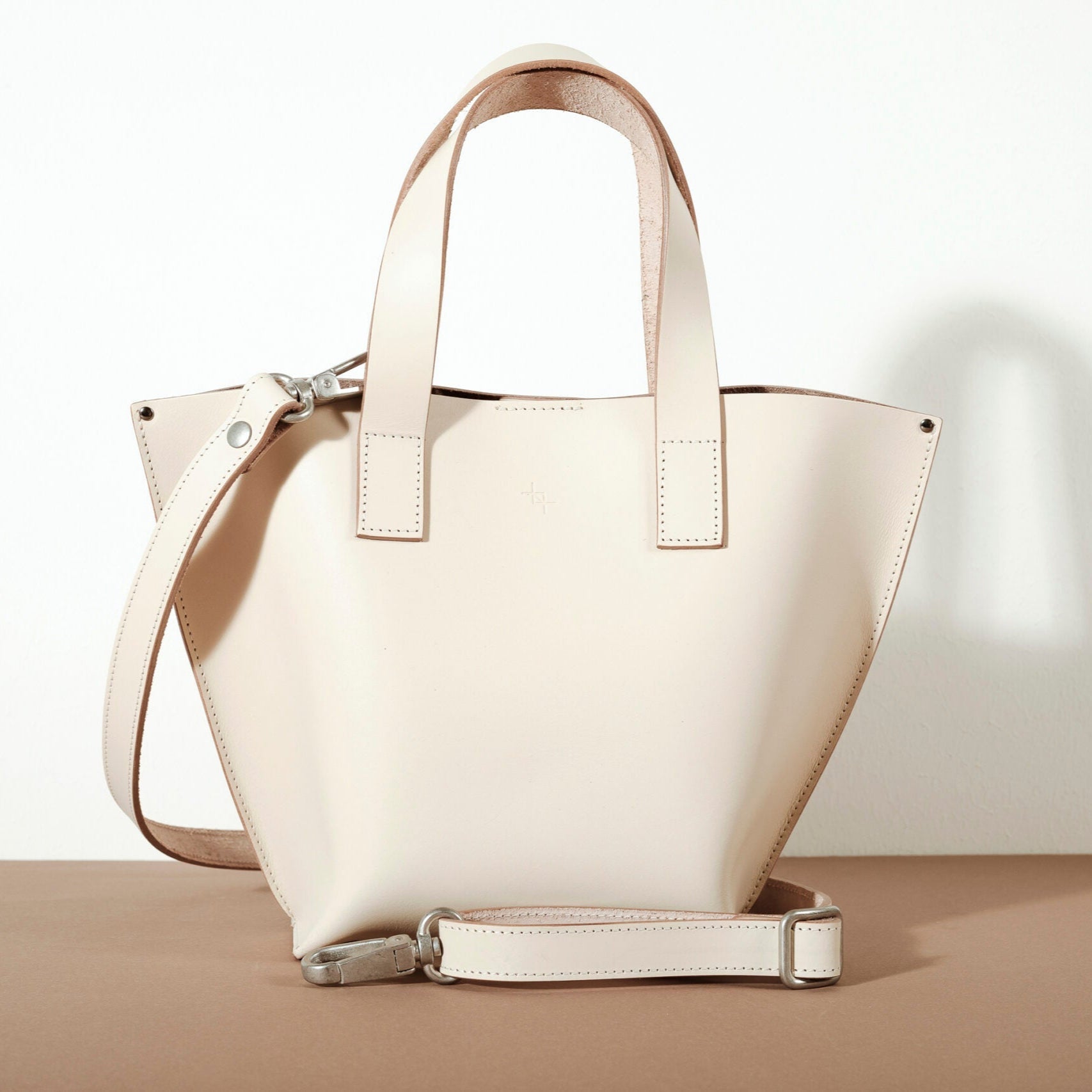 Your Perfect Companion: The Versatile Model Bucket Bag by Craftory at www.brixbailey.com
