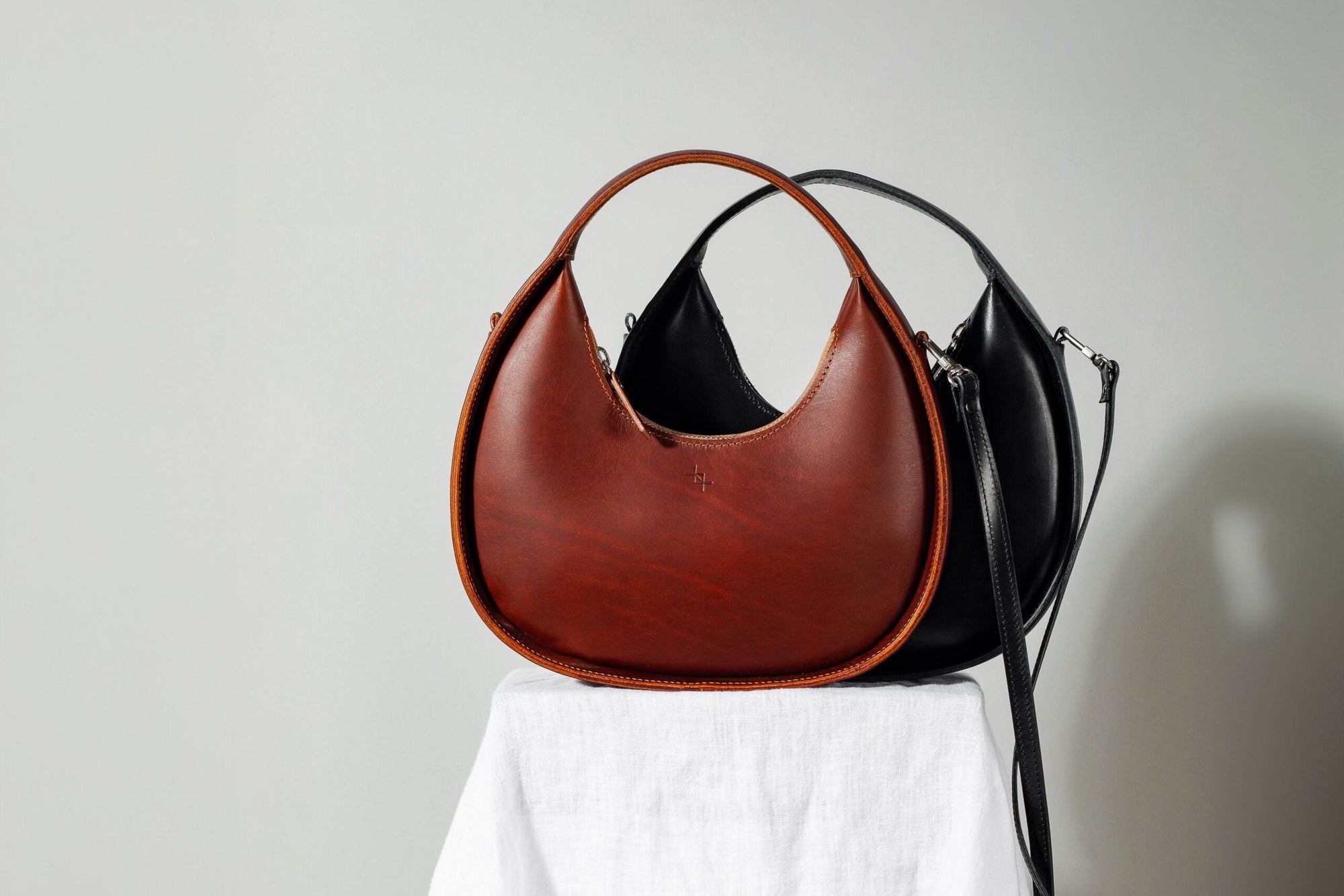Mini Moon Sling Bag – Elegant &amp; Versatile Leather Accessory by Craftory at brixbailey.com