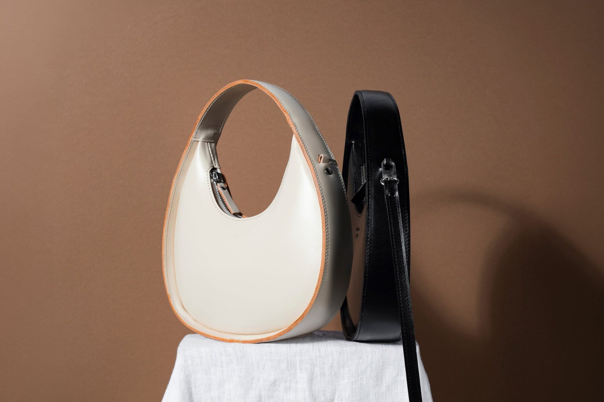 Mini Moon Sling Bag: Elegant &amp; Versatile Leather Essential by Craftory at brixbailey.com