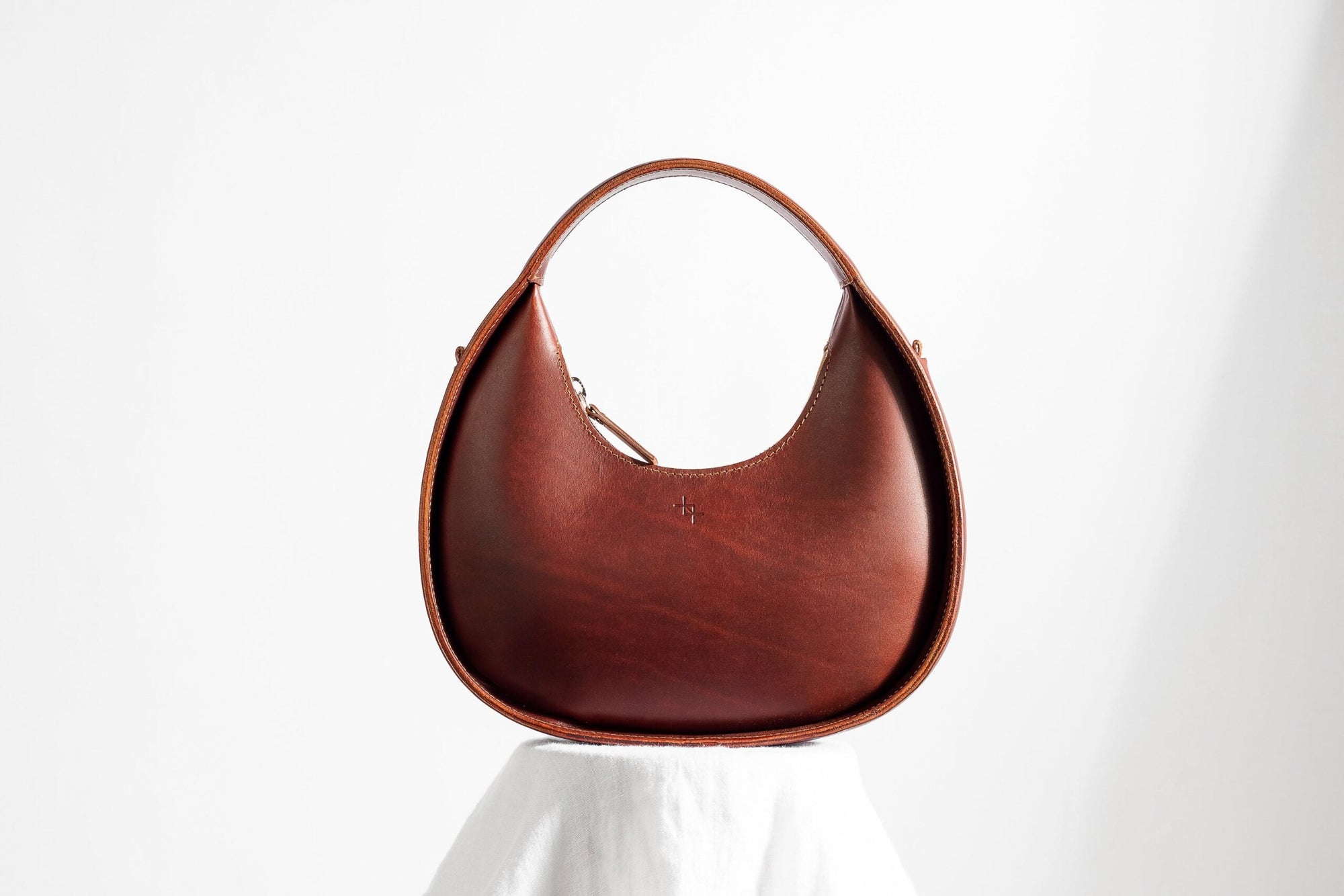 Elegant Mini Moon Sling Bag – Versatile &amp; Stylish Leather by Craftory at brixbailey.com