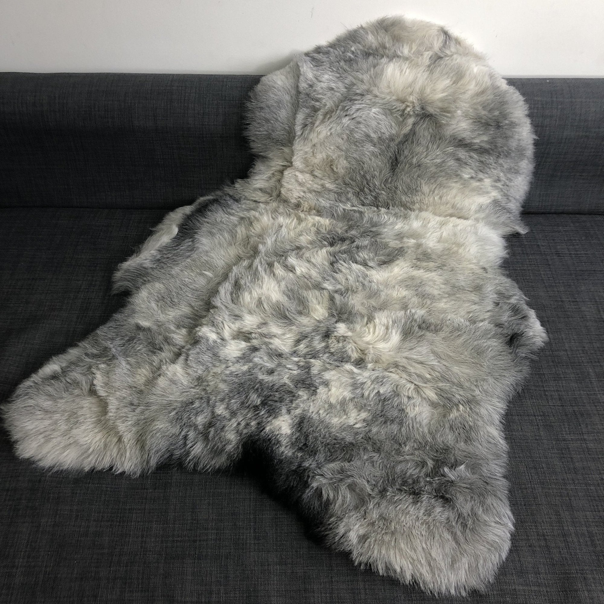 Luxury natural grey Icelandic sheepskin rug, premium undyed shorn 50mm sheep hide, ethically sourced free-range wool, best-selling sustainable home decor by Wildash London at brixbailey.com