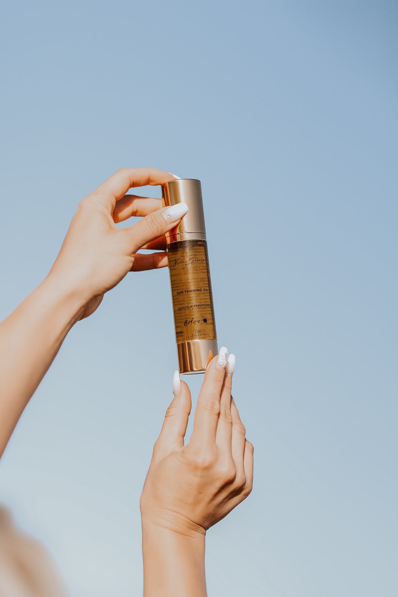 A Healthy Way to Tan: Natural Tanning Oil Blend for Faster, Even Tan and Skin Nourishment by North Beauty at www.brixbailey.com