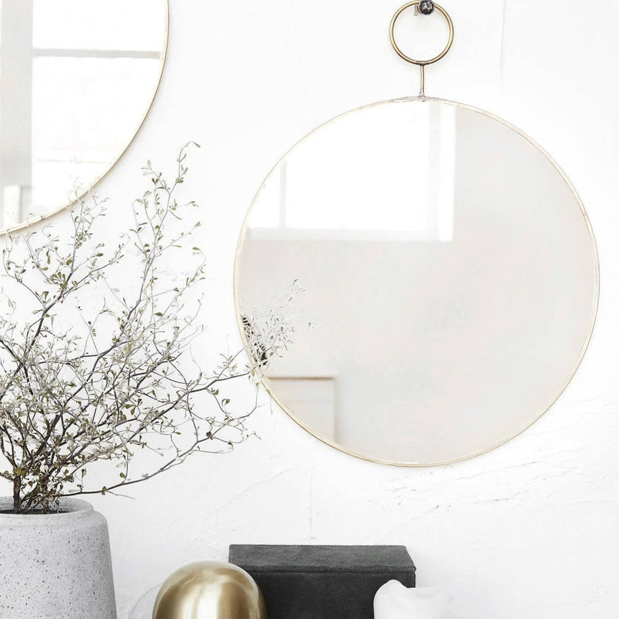 Round loop brass mirror, elegant oversized brass frame, stylish statement piece for home decor, luxury round wall mirror by Ella James at brixbailey.com