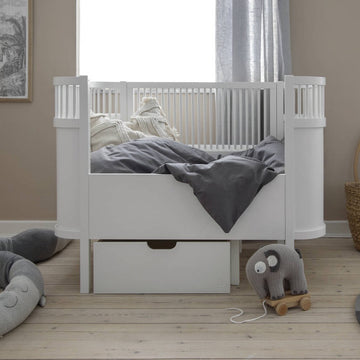 Luxury Sebra white baby and junior cot bed, premium beech wood, adjustable height, non-toxic paint, best-selling by Ella James at brixbailey.com