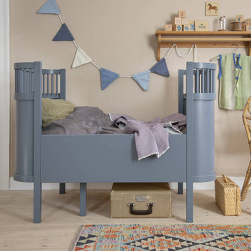 Sebra Baby & Jr Cot Bed, Danish design icon, luxury FSC-certified beech wood, adjustable height, extendable for toddlers by Ella James at brixbailey.com