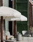 Luxury sand and white pinstripe parasol, premium vintage-style garden umbrella with beechwood pole and fringe by Ella James at brixbailey.com