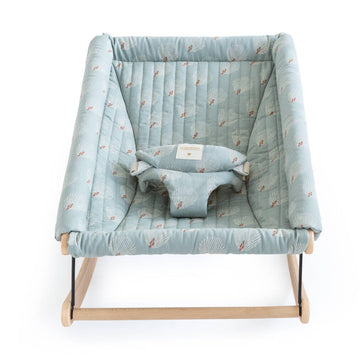 Premium organic cotton baby bouncer with beechwood frame, handcrafted quilted cover, peacock feather print, adjustable safety belt by Ella James at brixbailey.com