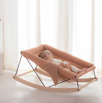 Premium baby bouncer in natural beech wood with organic cotton cover, stylish and safe, EN 12790 certified, perfect for newborns up to 9kg by Ella James at brixbailey.com