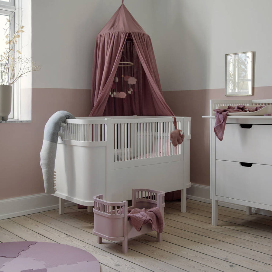 Luxury Sebra white baby and junior cot bed, premium beech wood, adjustable height, non-toxic paint, best-selling convertible crib by Ella James at brixbailey.com