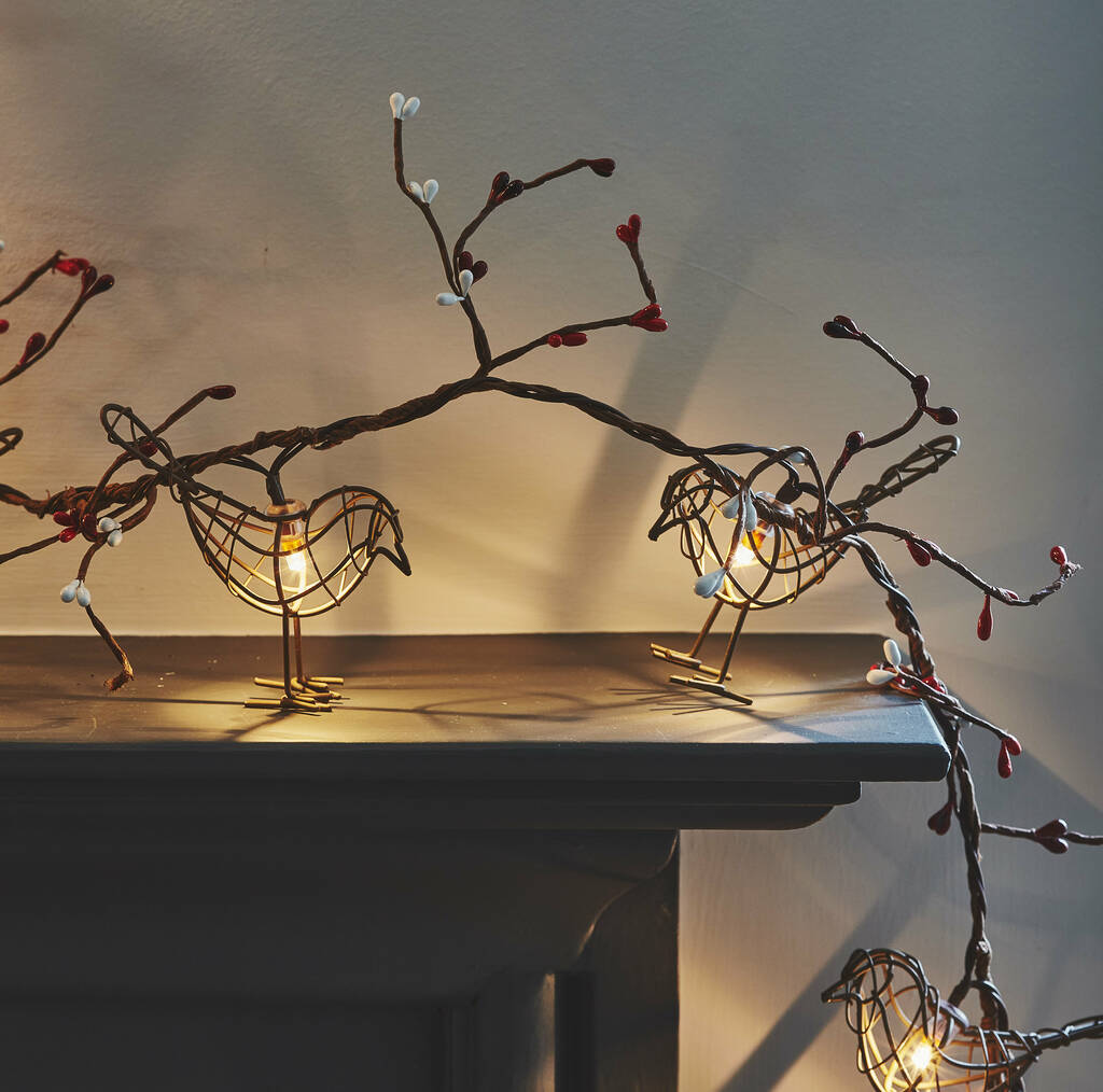 Luxury battery-operated LED robin lights garland with 12 dainty birds, warm white bulbs, and faux winter berries by Ella James at brixbailey.com