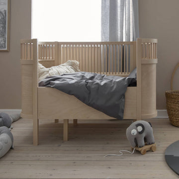 Premium Sebra wooden baby and junior cot bed, adjustable height, removable panels, grows with child, luxury design, best-selling by Ella James at brixbailey.com