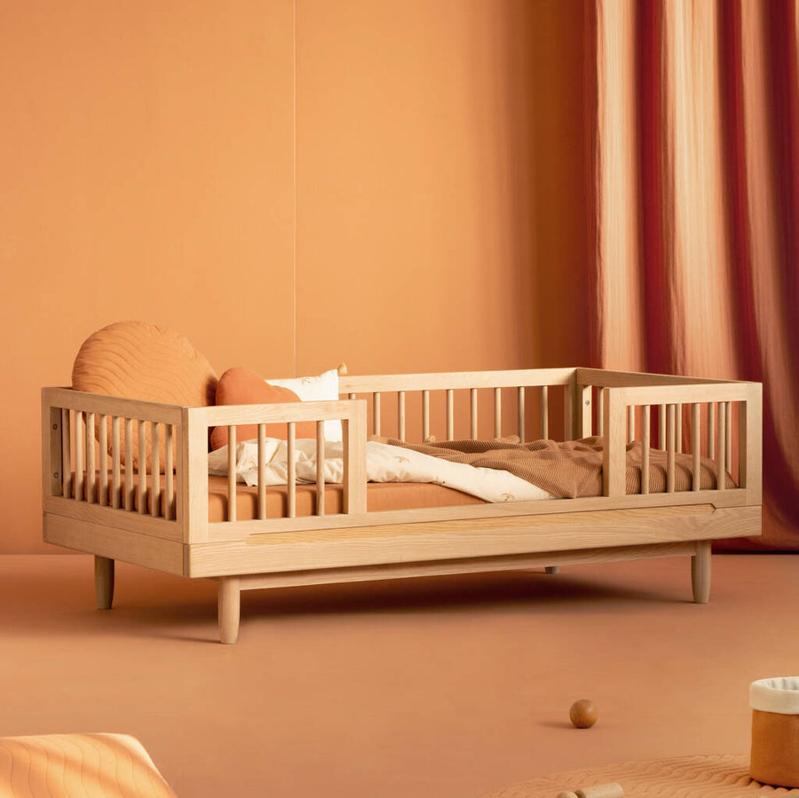 Luxury Nobodinoz solid oakwood junior bed, premium low-level transition bed with adjustable heights, elegant matte finish, 4 colorway kit by Ella James at brixbailey.com