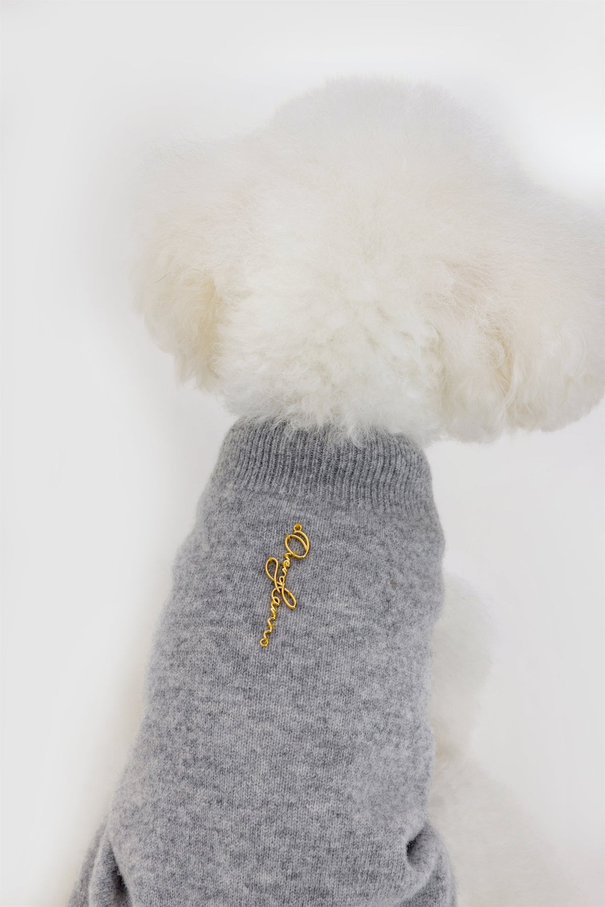 Sleeveless Jumper with Golden Metal Logo