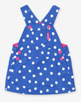 Premium blue corduroy pinafore dress with white dots, organic cotton, adjustable straps, front pocket, machine washable by Toby Tiger at brixbailey.com