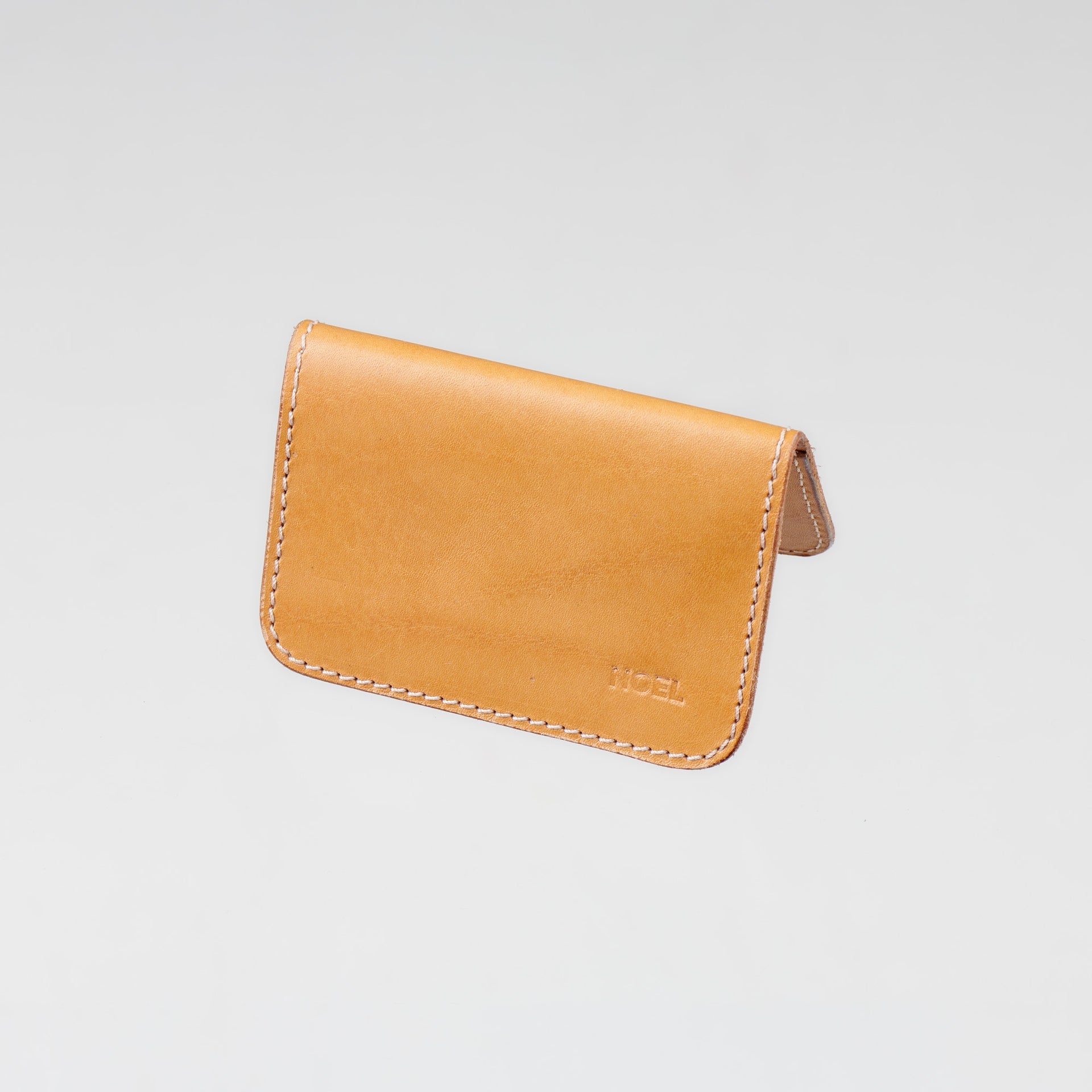 Noeli&#39;s Uniquely Minimalist Leather Card Holder with Cork Interior - Handcrafted in Tartu, Eco-Friendly Design by Noel at www.brixbailey.com
