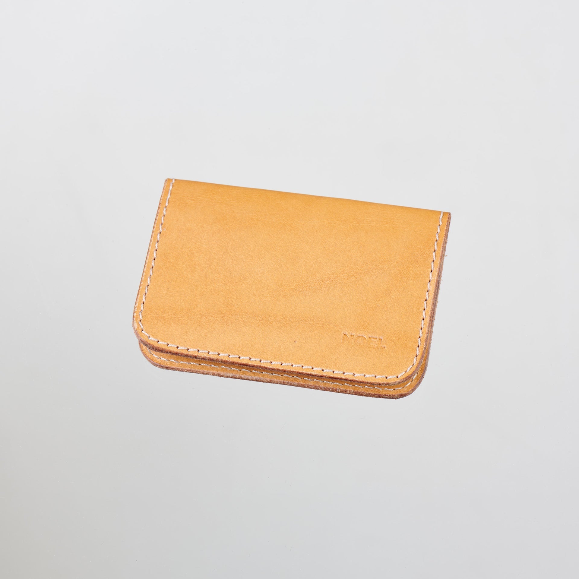 Light on Noeli Ultra-Minimalist Leather Card Holder with Cork Lining - Handcrafted in Tartu, Estonia by Noel at www.brixbailey.com