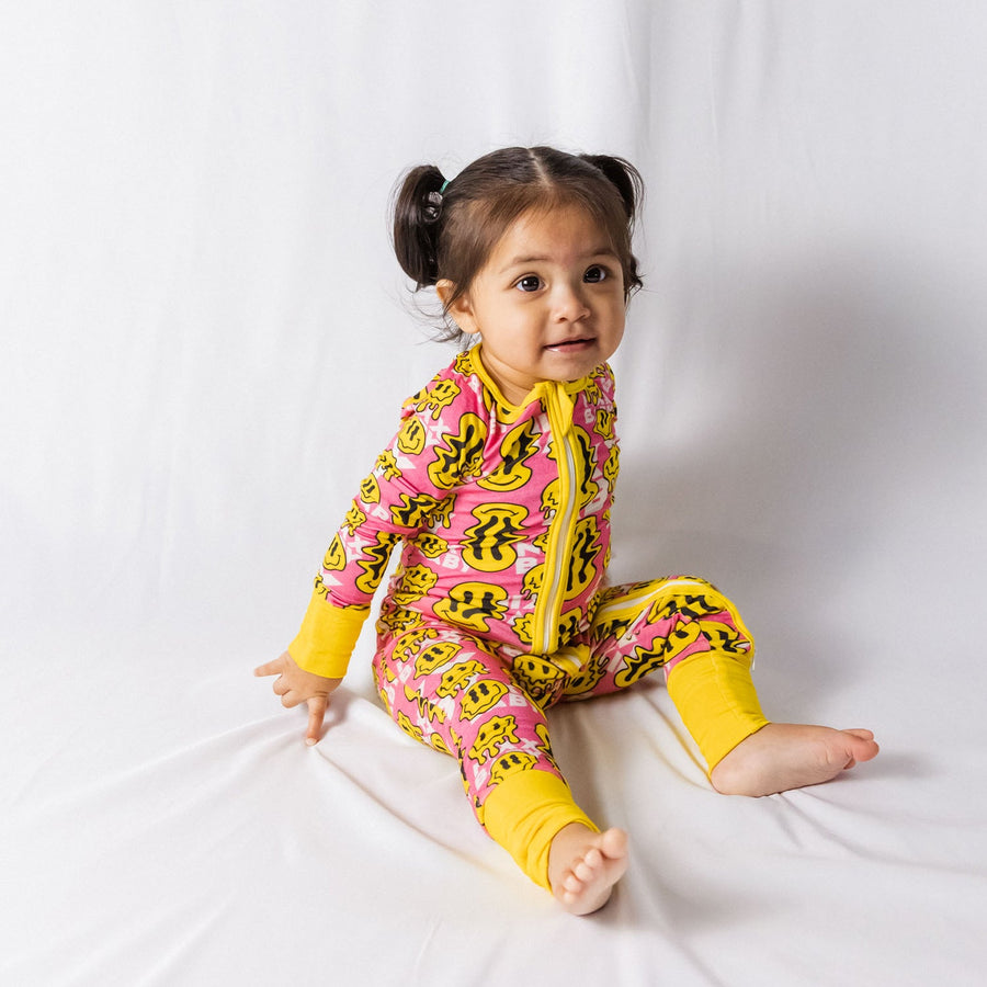 Trippy Smiles Pink Bamboo Zip Onesie - Buttery Soft Baby Sleeper with Fold Over Hands & Feet by NIXX BABY at brixbailey.com