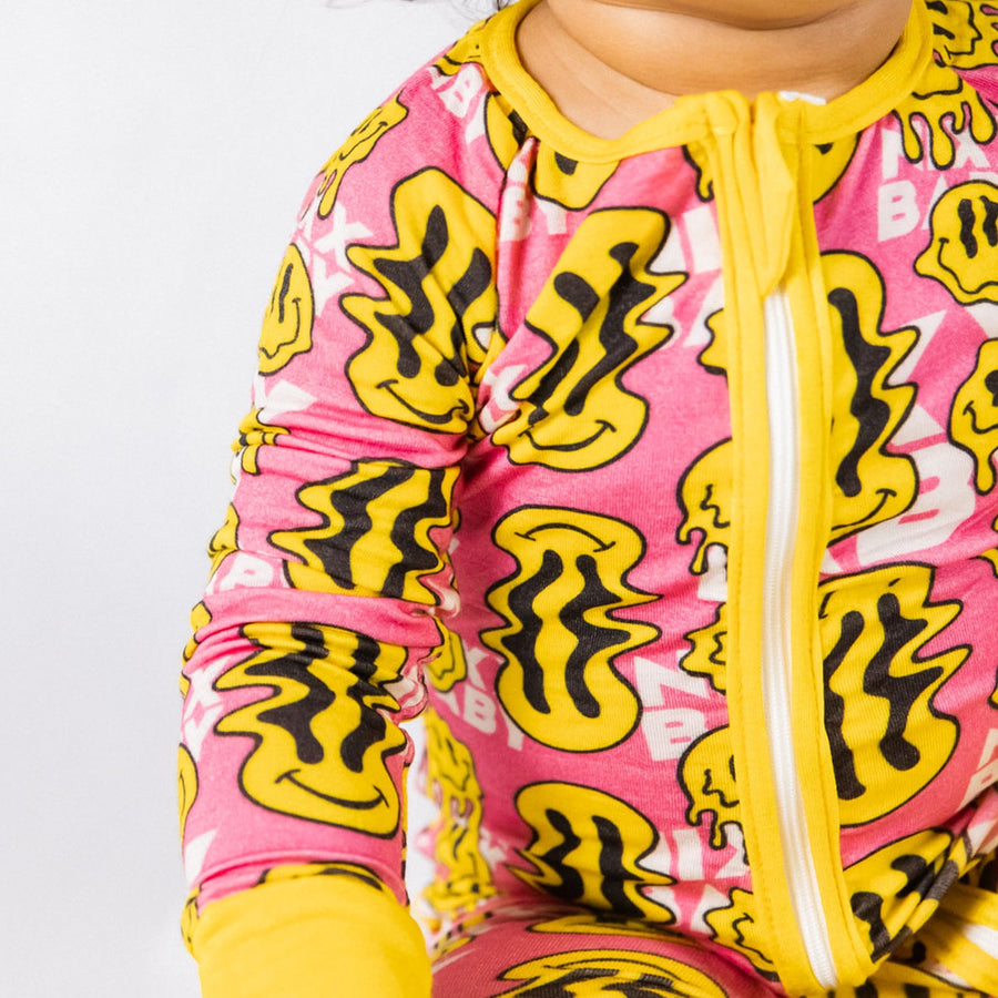 Trippy Smiles Pink Bamboo Zip Onesie - Soft Stretch Sleeper for Baby Girls by NIXX BABY at brixbailey.com