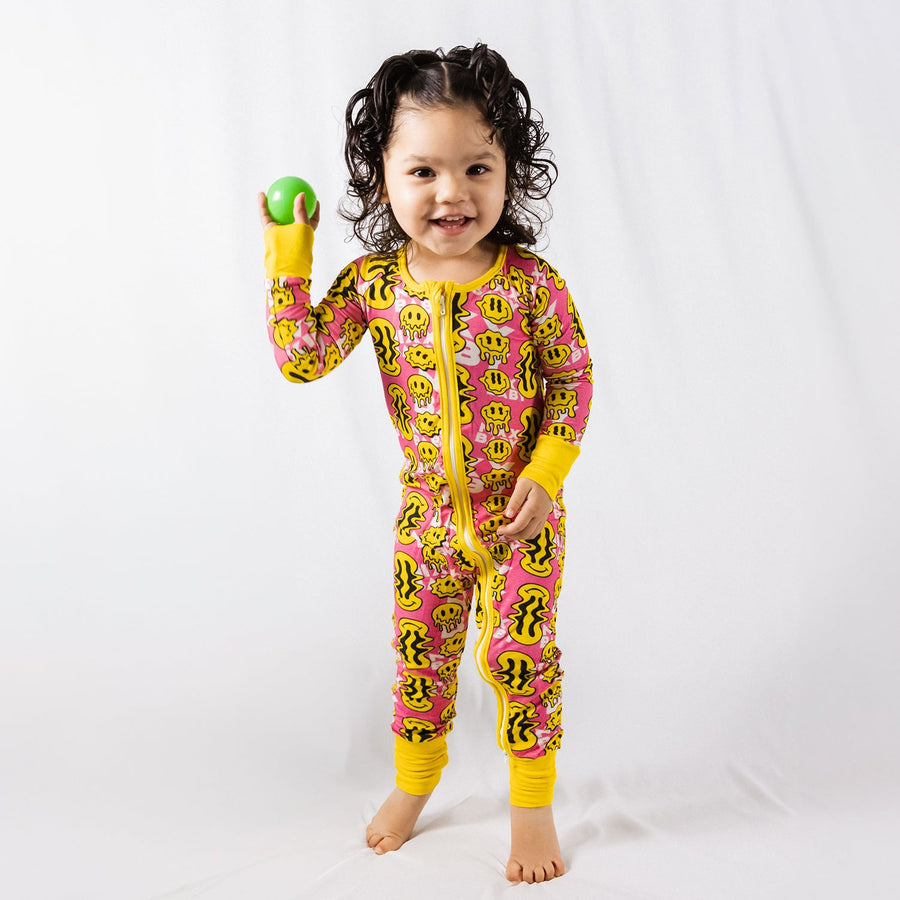 Trippy Smiles Pink Bamboo Zip Onesie - Soft Stretch Baby Sleeper with Fold Over Hands & Feet by NIXX BABY at brixbailey.com