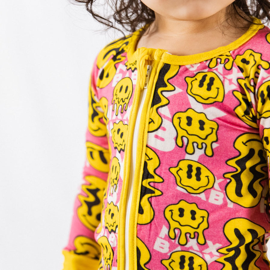 Trippy Smiles Pink Bamboo Zip Onesie - Soft Stretch Sleeper for Baby Girls by NIXX BABY at brixbailey.com