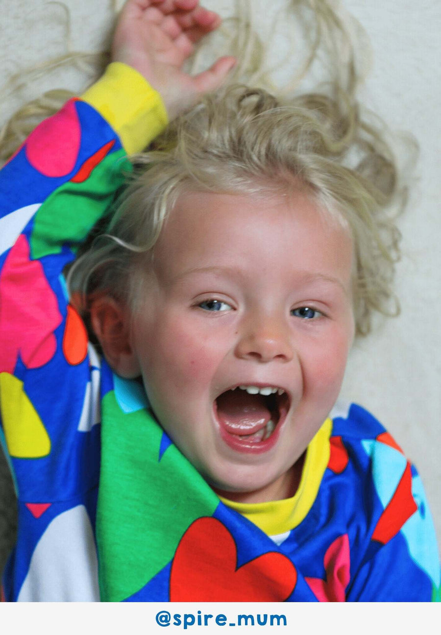 Luxury premium Toby Tiger sleepwear with heart print, soft organic cotton baby pajamas, stylish hand-drawn blue and yellow design by Toby Tiger at brixbailey.com