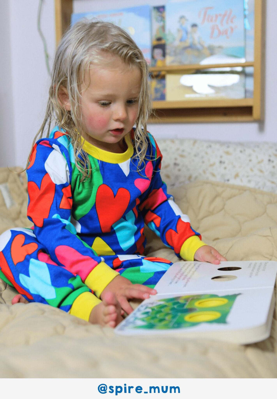 Luxury premium Toby Tiger sleepwear, soft organic cotton pajamas with hand-drawn heart print, light blue and yellow trim, best-selling kids pajama set by Toby Tiger at brixbailey.com