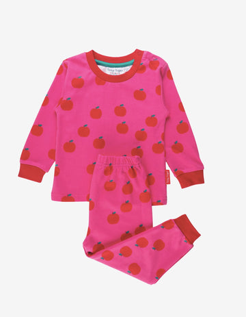Dream in vibrant colors with this bold pink and red organic kids pajama set, featuring ultra-soft GOTS-certified cotton, stretchy waistband, and cozy cuffs for a comfortable sleep by Toby Tiger at brixbailey.com