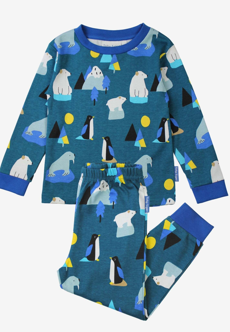 Premium kids organic cotton pajama set with arctic animal print, cozy blue penguin walrus polar bear design, soft GOTS certified sleepwear by Toby Tiger at brixbailey.com