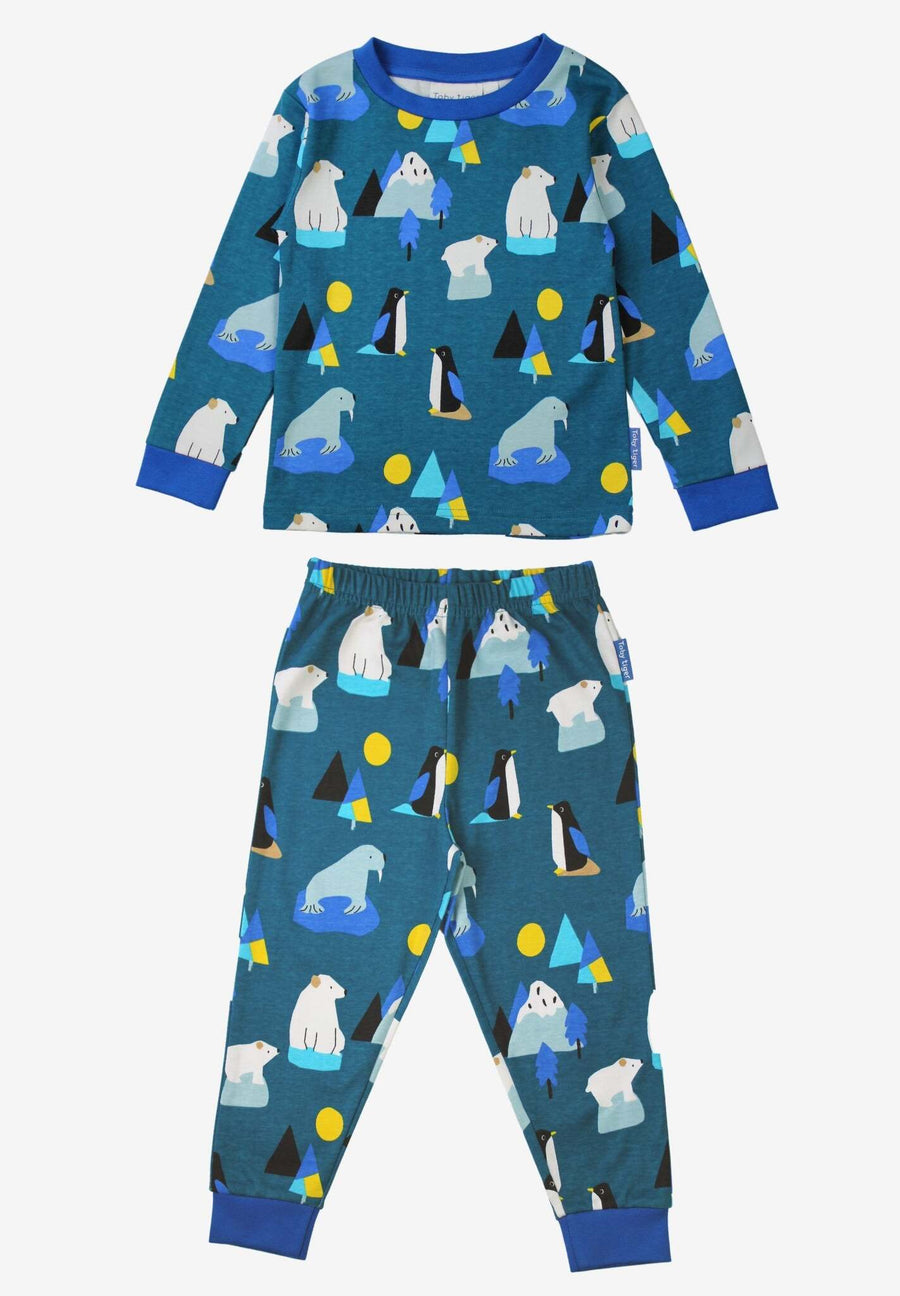 Premium organic cotton kids pajamas with arctic animal print, cozy blue penguin walrus polar bear sleepwear, soft GOTS certified by Toby Tiger at brixbailey.com