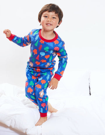 Premium organic cotton kids pajama set, cozy two-piece with camping bear print, soft GOTS-certified fabric, machine washable by Toby Tiger at brixbailey.com