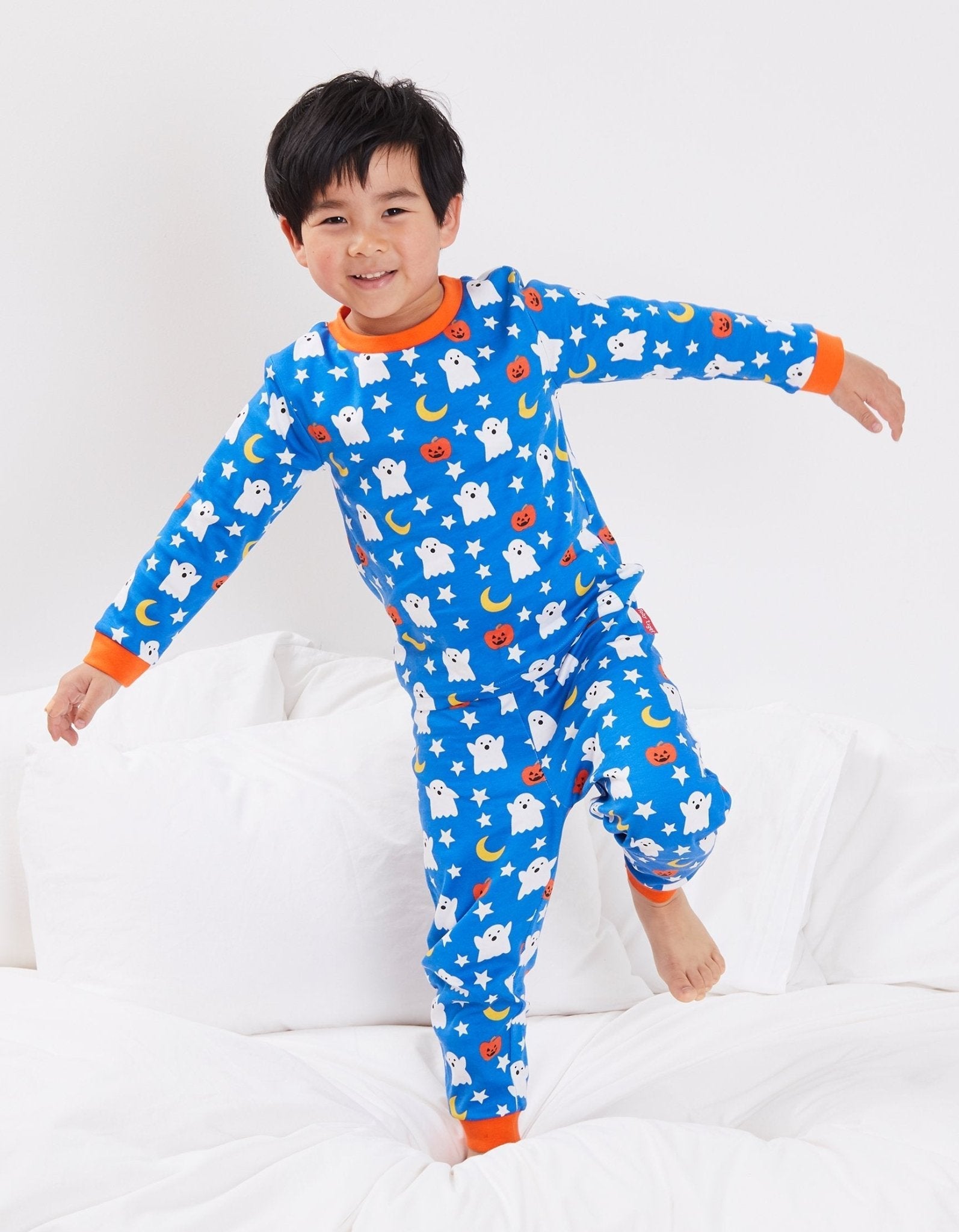 Friendly Ghosts Halloween Kids Pajama Set in GOTS Certified Organic Cotton, Soft and Comfortable Sleepwear for Children by Toby Tiger at brixbailey.com