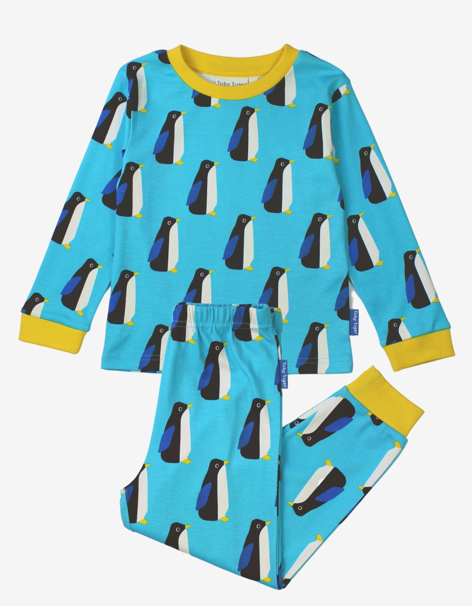Premium Organic Cotton Kids Pajama Set with Adorable Penguin Print and Yellow Trim by Toby Tiger at brixbailey.com