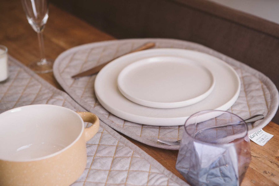 Premium organic cotton quilted table runner pair, stylish chambray weave, luxury dining decor, best-selling modern table setting by Karpāsa London at brixbailey.com