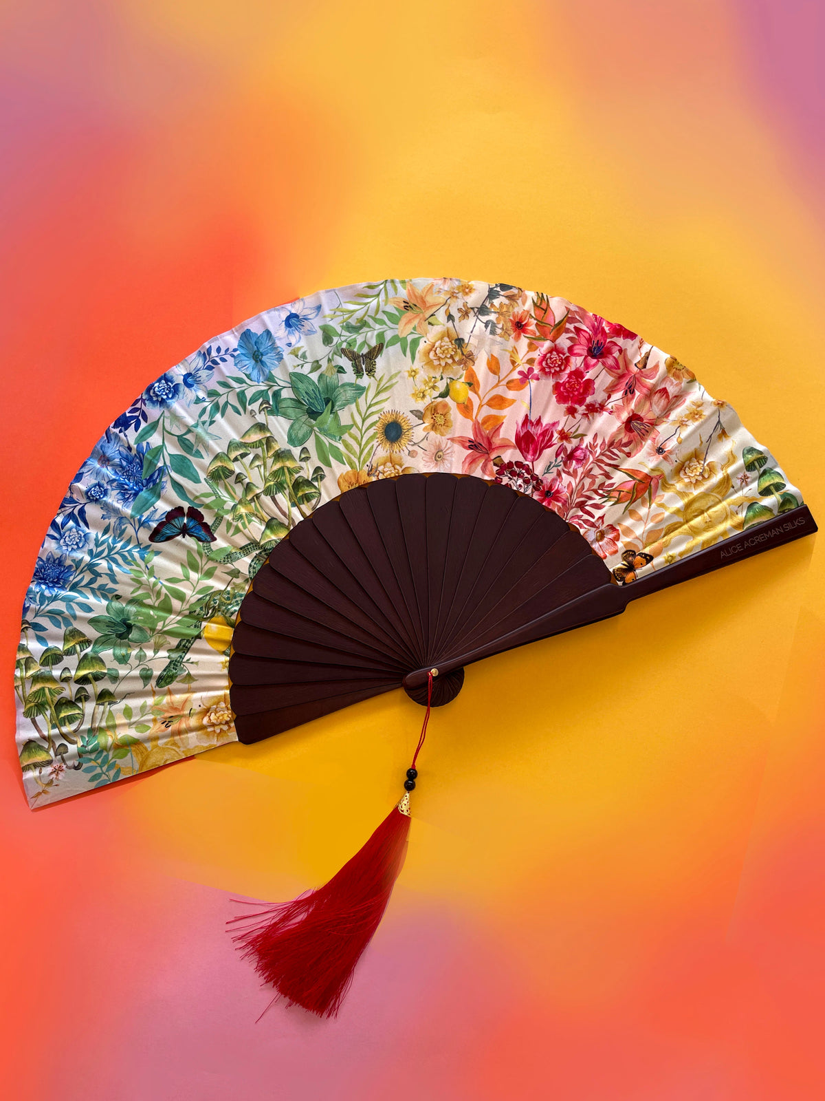 Colourful Silk folding hand fan 'kaleido-bloom' print with floral &amp; nature filled rainbow design