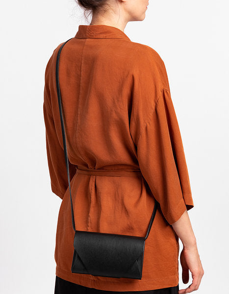 Versatile Leather Clutch Wallet with Adjustable Strap