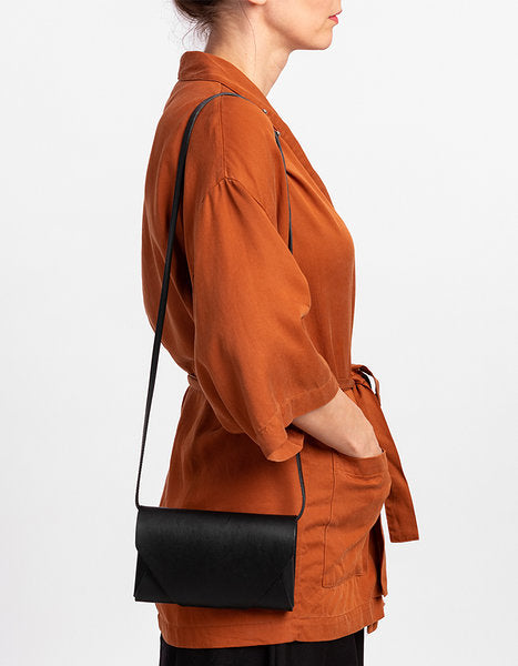Versatile Leather Clutch Wallet with Adjustable Strap