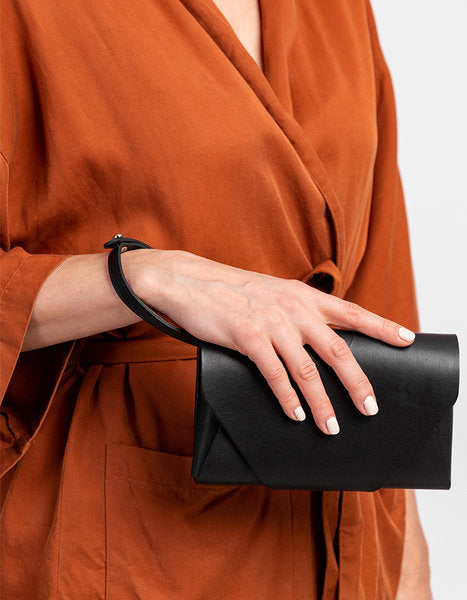 Versatile Leather Clutch Wallet with Adjustable Strap