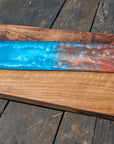 Walnut striking blue and bronze river board