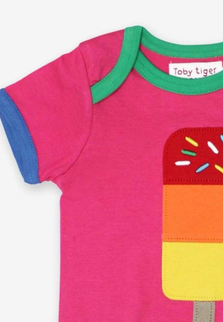 Premium baby summer romper with lollipop applique, organic cotton, short sleeves, snap buttons, stylish pink, sustainable, GOTS certified by Toby Tiger at brixbailey.com