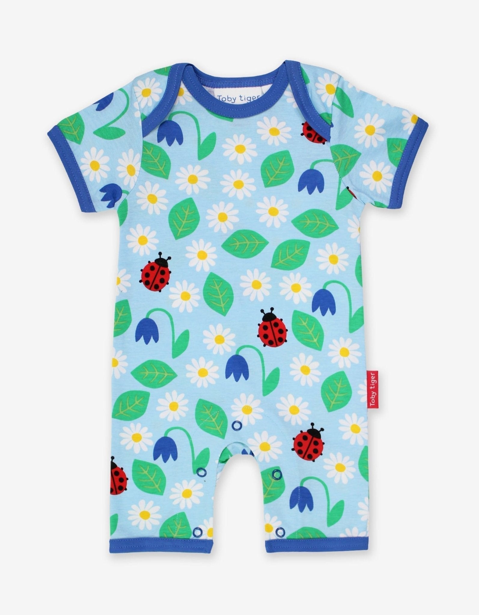 Premium baby summer romper with ladybug print in soft certified organic cotton, stylish short legs, snap buttons, best-selling design by Toby Tiger at brixbailey.com