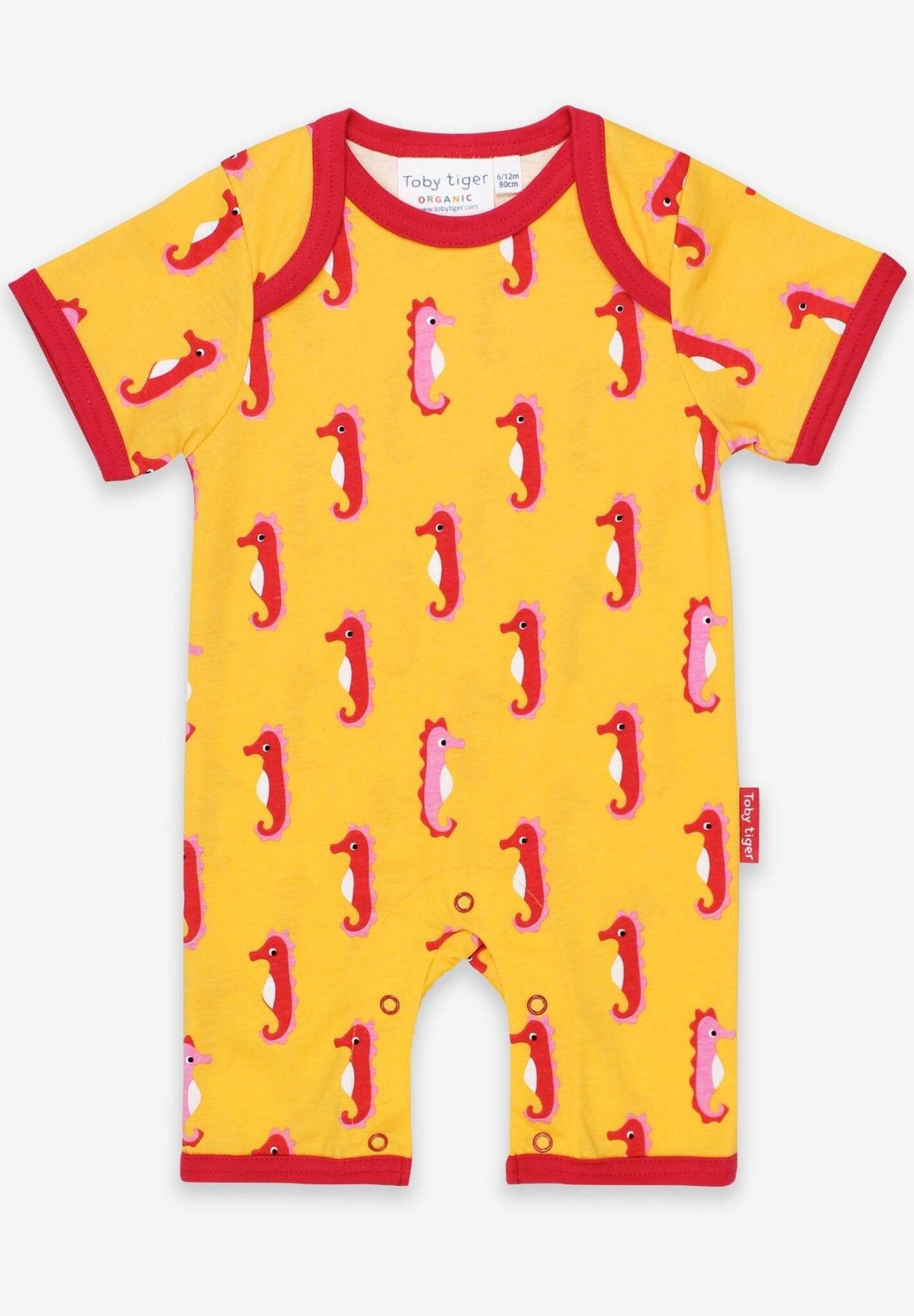 Luxury baby romper with short legs, stylish seahorse design, red trim, snap buttons, GOTS certified organic cotton, machine washable by Toby Tiger at brixbailey.com