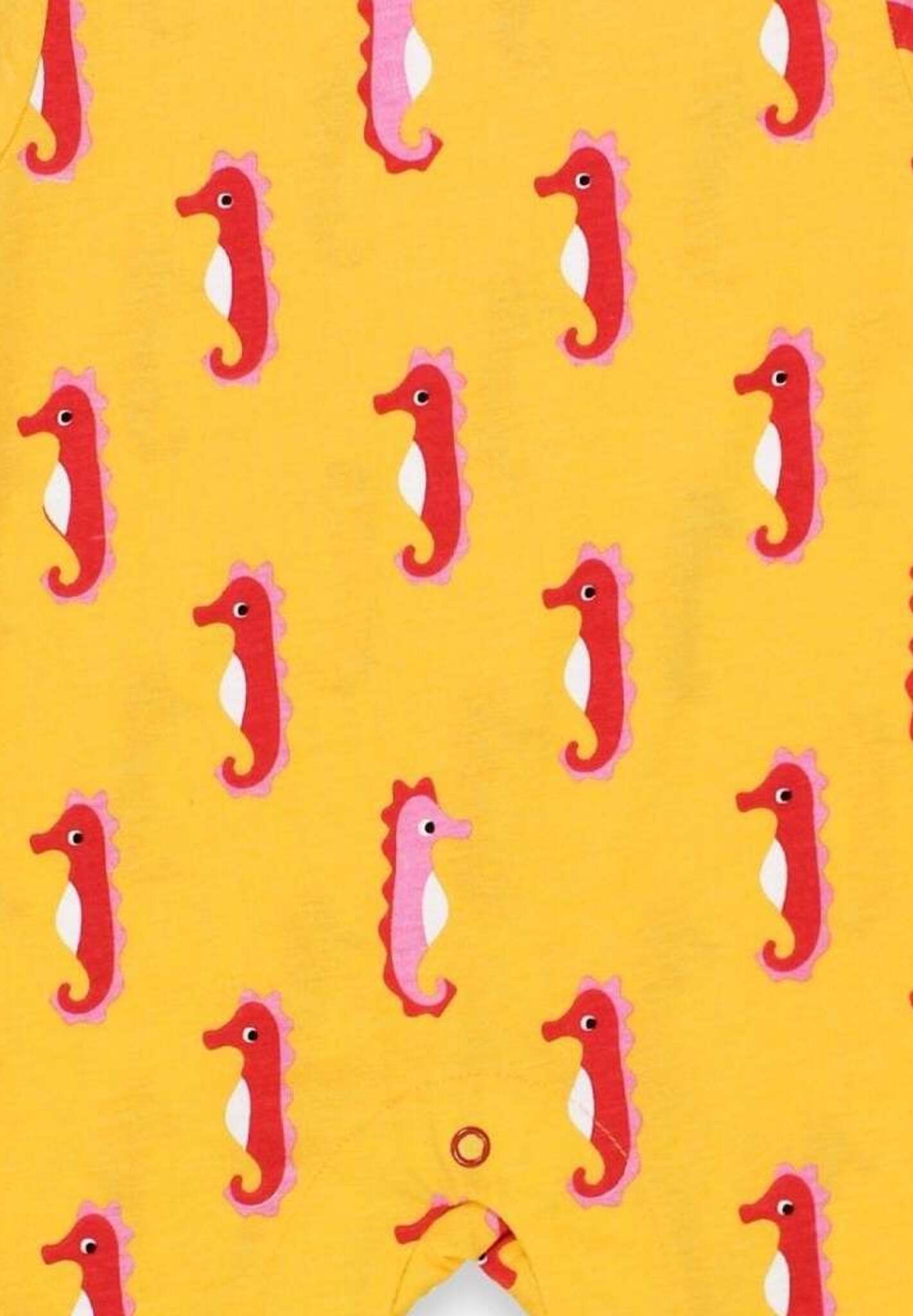 Luxury baby romper with short legs, playful seahorse design, red trim, snap buttons, organic cotton, sustainable fashion by Toby Tiger at brixbailey.com
