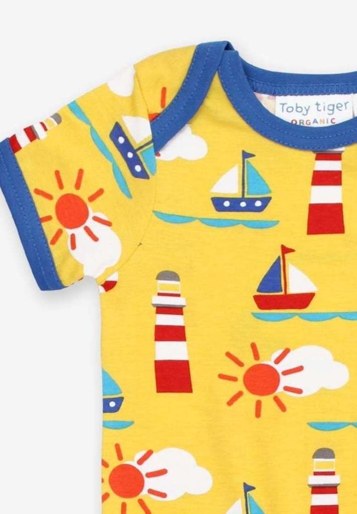 Charming Yellow Summer Romper for Baby’s First Beach Holiday - Soft Organic Cotton, Toby Tiger Design, Easy Snap Legs by Toby Tiger at brixbailey.com