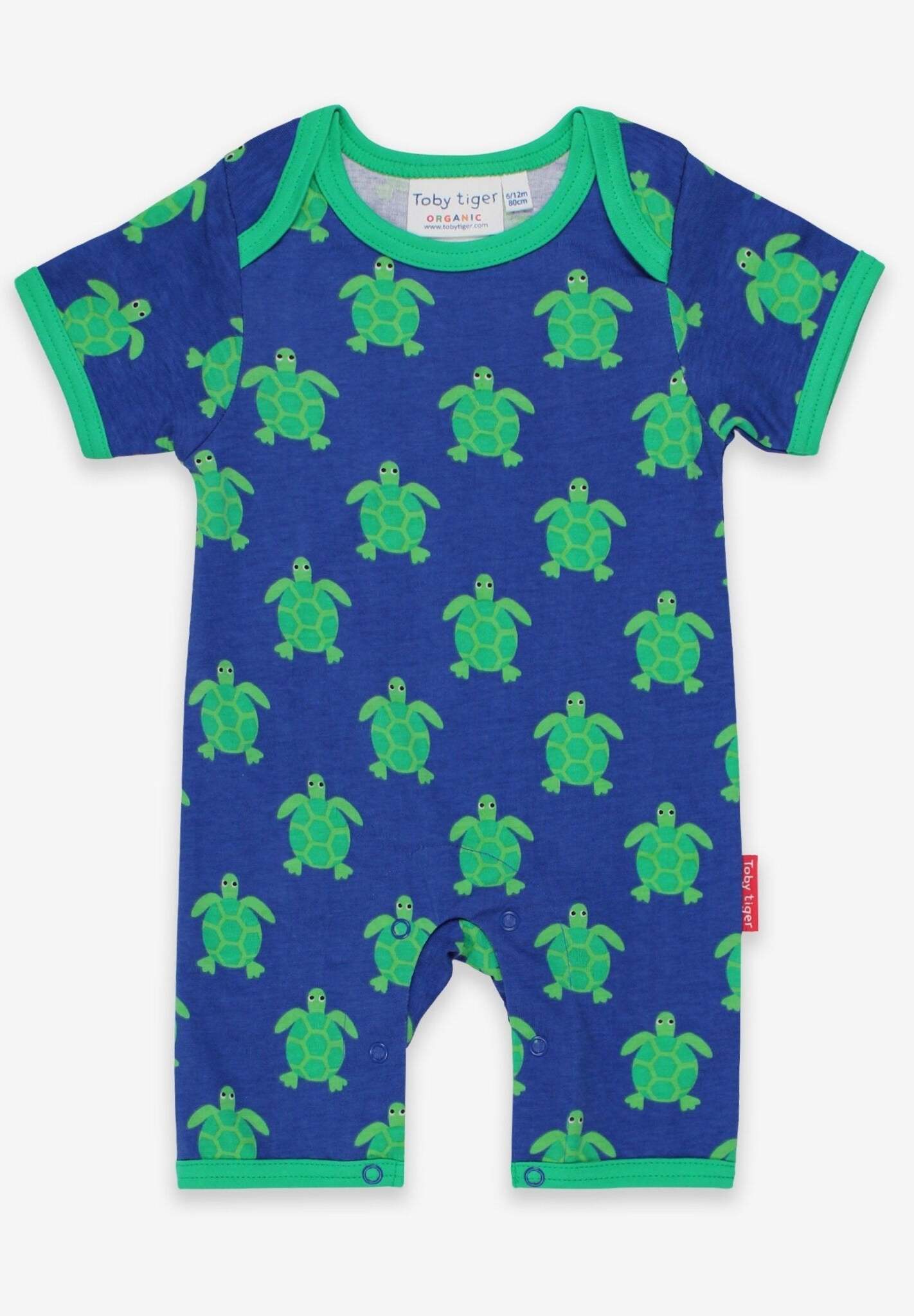 Premium baby romper with short legs, cute turtle print, organic cotton, snap buttons, soft breathable fabric, stylish summer outfit by Toby Tiger at brixbailey.com