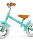 a soft-focus side view of the marshall balance bike with its comfortable saddle and smooth air tires