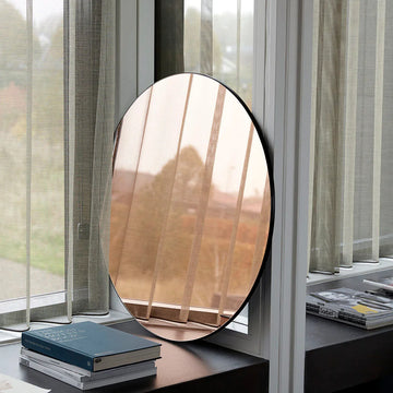 Luxury rose gold tint mirror, classic Danish design, premium mirrored glass, stylish atmospheric warmth for room decor by Ella James at brixbailey.com