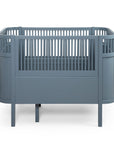 Sebra Baby & Jr Cot Bed, Danish design icon, FSC-certified beech wood, adjustable base, EU Ecolabel, Forest Lake Blue by Ella James at brixbailey.com