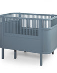 Sebra Baby & Jr Cot Bed, premium Danish design, FSC-certified beech wood, adjustable base, eco-friendly, stylish Forest Lake Blue by Ella James at brixbailey.com